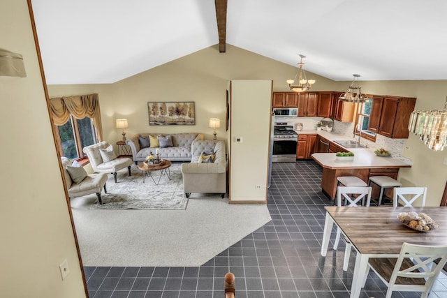12976 W 21st St, Wadsworth, IL 60083 - living room with dark colored carpet, a chandelier, and dark tile patterned floors