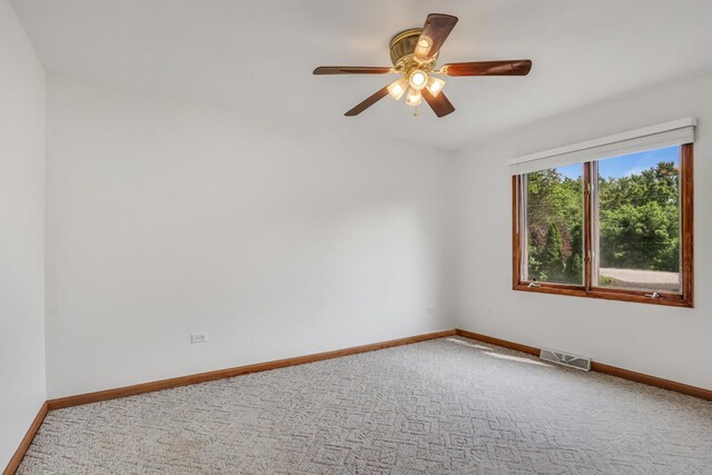 12976 W 21st St, Wadsworth, IL 60083 - carpeted empty room featuring baseboards and ceiling fan
