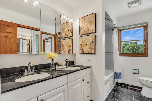 12976 W 21st St, Wadsworth, IL 60083 - bathroom featuring marble finish floors, double vanity, and shower / bath combination with curtain