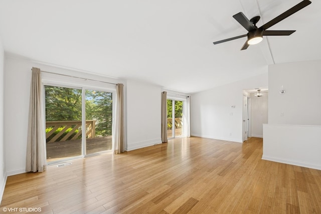 104 Hastings Way SW, Poplar Grove, IL 61065 - spare room with light wood-style flooring, ceiling fan, and vaulted ceiling
