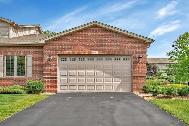 11186 188th Pl, Mokena, IL 60448 - garage featuring asphalt driveway