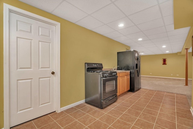11186 188th Pl, Mokena, IL 60448 - kitchen with black appliances, recessed lighting, a paneled ceiling, light colored carpet, and light tile patterned flooring