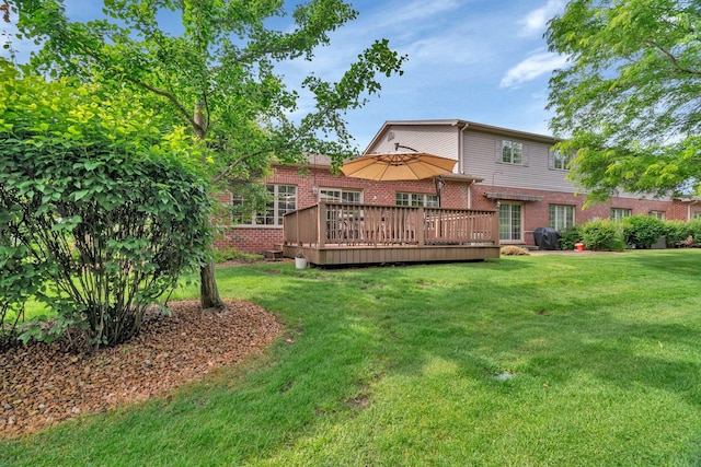 11186 188th Pl, Mokena, IL 60448 - rear view of property with brick siding, a lawn, and a wooden deck