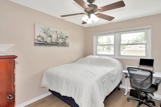 14727 Central Park Ave, Midlothian, IL 60445 - bedroom with wood finished floors, a desk, and ceiling fan