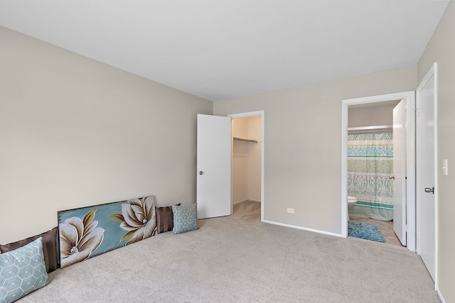 403 Sandalwood Ln Unit C1, Schaumburg, IL 60193 - unfurnished bedroom featuring carpet floors, ensuite bathroom, and a spacious closet