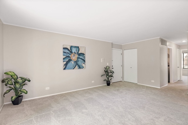 403 Sandalwood Ln Unit C1, Schaumburg, IL 60193 - empty room with light carpet and ornamental molding