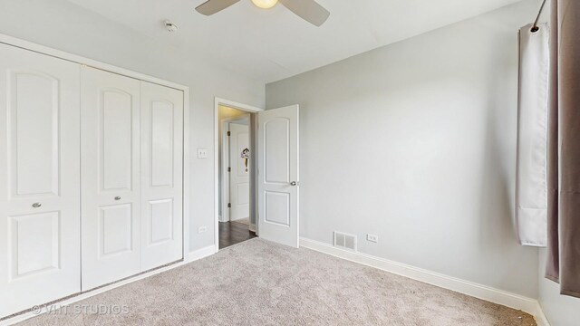 8211 S Cornell Ave, Chicago, IL 60617 - unfurnished bedroom with carpet flooring, a closet, and ceiling fan