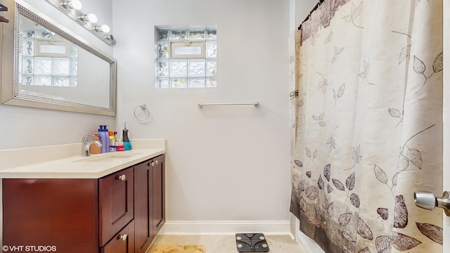 8211 S Cornell Ave, Chicago, IL 60617 - full bathroom with vanity and a shower with curtain