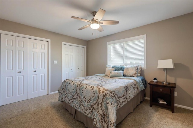 13907 W Big Run Ln, Homer Glen, IL 60491 - bedroom featuring two closets, light colored carpet, and a ceiling fan