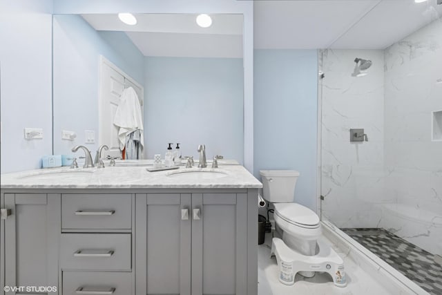 5862 N Lincoln Ave Unit 3A, Chicago, IL 60659 - full bathroom featuring double vanity and a marble finish shower