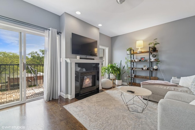 5862 N Lincoln Ave Unit 3A, Chicago, IL 60659 - living room with dark wood finished floors, a fireplace with flush hearth, and recessed lighting