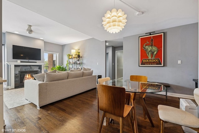 5862 N Lincoln Ave Unit 3A, Chicago, IL 60659 - living area with wood finished floors, a fireplace, a ceiling fan, and recessed lighting