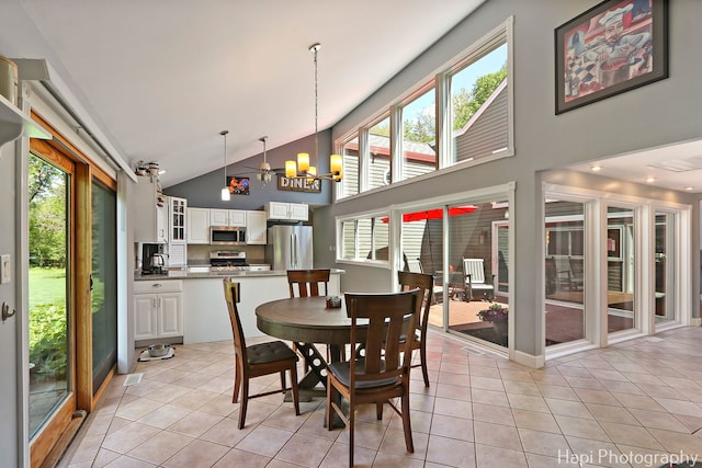 1504 N Denali Trl, Mchenry, IL 60050 - dining room with high vaulted ceiling, a chandelier, and light tile patterned floors
