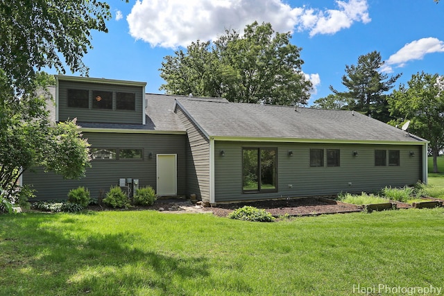 1504 N Denali Trl, Mchenry, IL 60050 - rear view of house with a yard and roof with shingles