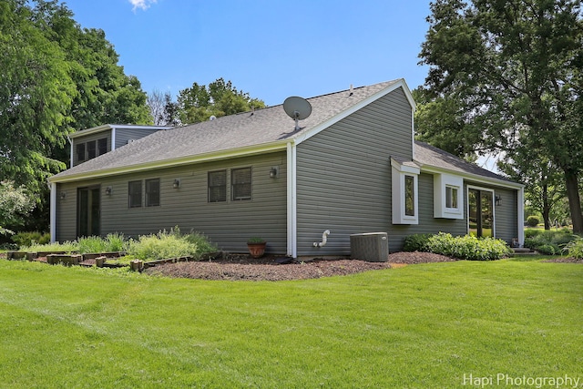 1504 N Denali Trl, Mchenry, IL 60050 - view of property exterior featuring a yard and roof with shingles