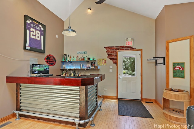 1504 N Denali Trl, Mchenry, IL 60050 - indoor dry bar with wood finished floors and high vaulted ceiling