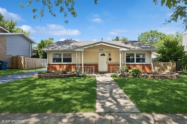 14928 Millard Ave, Midlothian, IL 60445 - bungalow-style home featuring brick siding, a porch, and roof with shingles