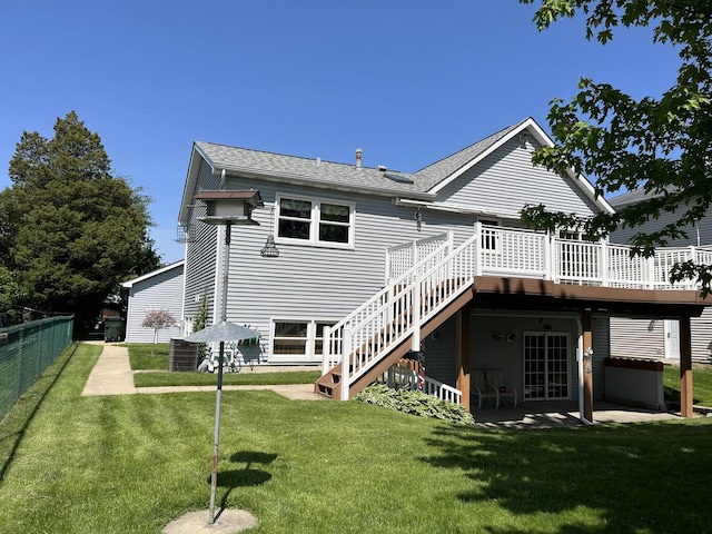 1905 E Grand Ave, Lindenhurst, IL 60046 - back of property featuring a deck, stairway, and roof with shingles