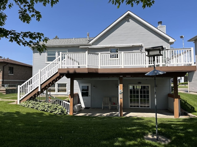 1905 E Grand Ave, Lindenhurst, IL 60046 - rear view of property featuring a wooden deck, a yard, and a patio area