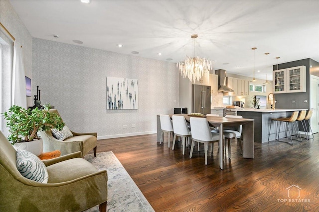 3800 N Christiana Ave, Chicago, IL 60618 - dining area with a chandelier, dark wood finished floors, and wallpapered walls