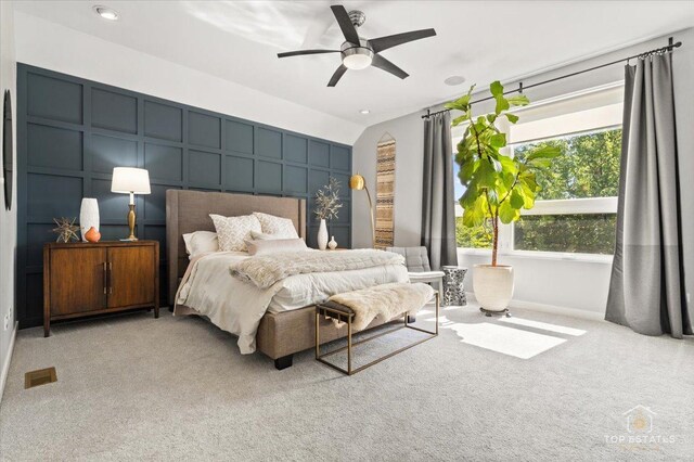 3800 N Christiana Ave, Chicago, IL 60618 - carpeted bedroom featuring a decorative wall and a ceiling fan
