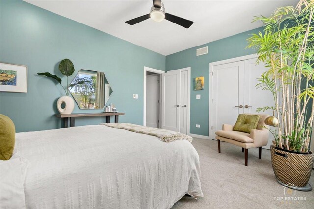 3800 N Christiana Ave, Chicago, IL 60618 - bedroom featuring carpet floors, two closets, and a ceiling fan