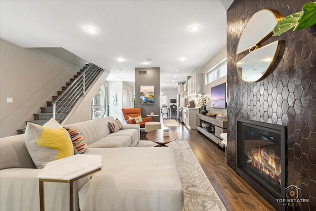 3800 N Christiana Ave, Chicago, IL 60618 - living area featuring a fireplace, dark wood-type flooring, stairway, and recessed lighting