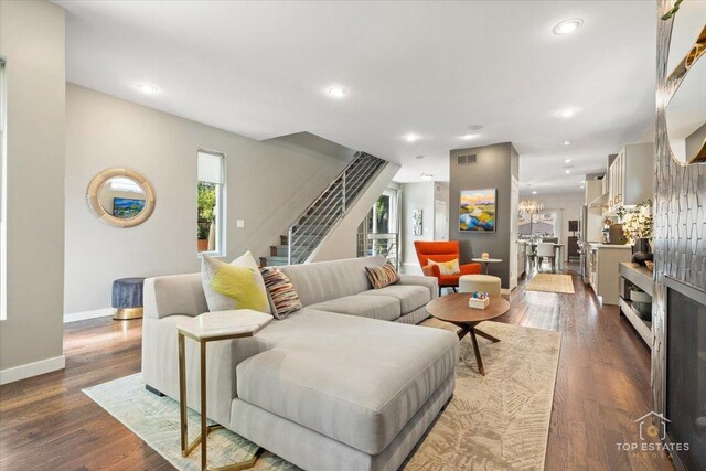 3800 N Christiana Ave, Chicago, IL 60618 - living area featuring stairway, dark wood-style floors, and recessed lighting