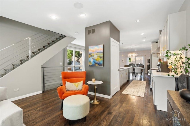 3800 N Christiana Ave, Chicago, IL 60618 - living room with plenty of natural light, dark wood finished floors, stairway, and recessed lighting