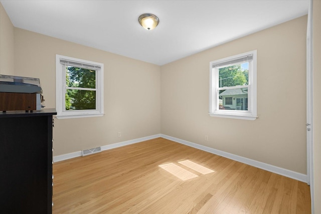 4606 Willow Ln, Mchenry, IL 60050 - unfurnished bedroom featuring wood finished floors and baseboards