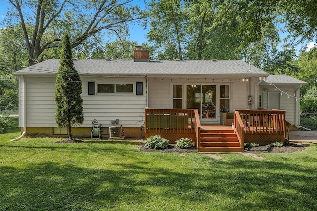 4606 Willow Ln, Mchenry, IL 60050 - back of property featuring a chimney, a wooden deck, a yard, and a shingled roof