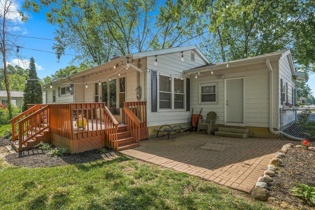 4606 Willow Ln, Mchenry, IL 60050 - rear view of property with a wooden deck, a patio, and entry steps
