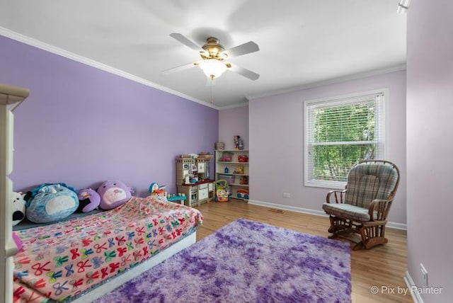 987 Split Rail Dr, Carol Stream, IL 60188 - bedroom featuring wood finished floors, crown molding, and a ceiling fan