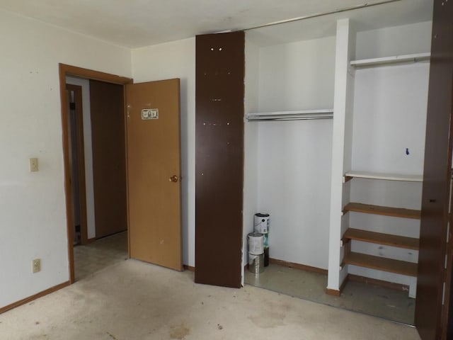 1412 11th Ave, Sterling, IL 61081 - unfurnished bedroom with a closet and baseboards