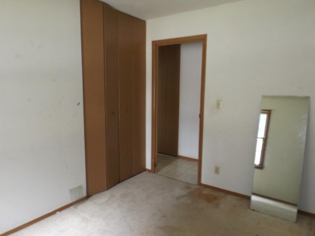 1412 11th Ave, Sterling, IL 61081 - unfurnished room with light colored carpet