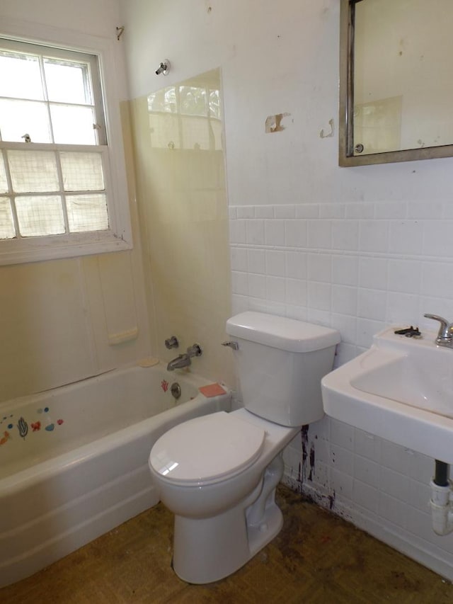 1412 11th Ave, Sterling, IL 61081 - full bathroom featuring tile walls,  shower combination, and wainscoting