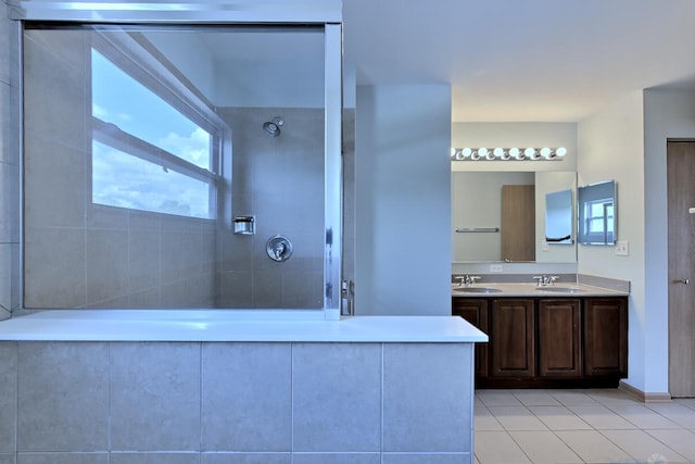 2141 Bluemist Dr, Aurora, IL 60504 - bathroom with tile patterned floors, double vanity, and tiled shower
