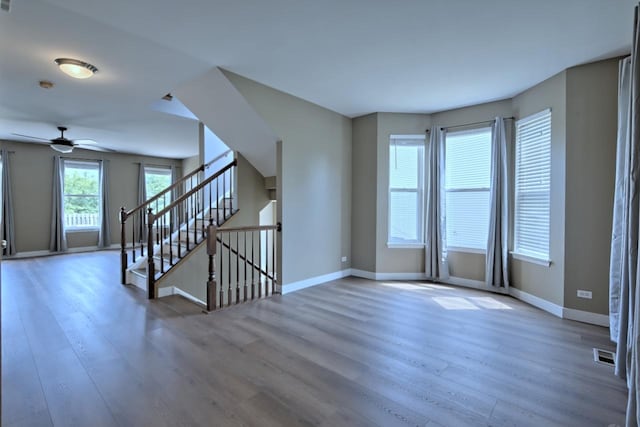 2141 Bluemist Dr, Aurora, IL 60504 - spare room with wood finished floors and ceiling fan