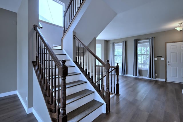 2141 Bluemist Dr, Aurora, IL 60504 - stairs with baseboards and wood finished floors