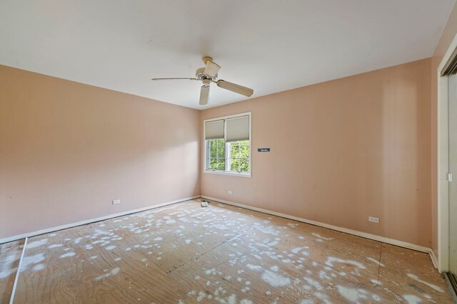 201 E White Oak St, Arlington Heights, IL 60005 - empty room with ceiling fan and baseboards