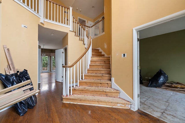 201 E White Oak St, Arlington Heights, IL 60005 - stairway with wood finished floors and a towering ceiling
