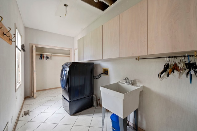 201 E White Oak St, Arlington Heights, IL 60005 - laundry area with cabinet space, light tile patterned floors, and washer and clothes dryer