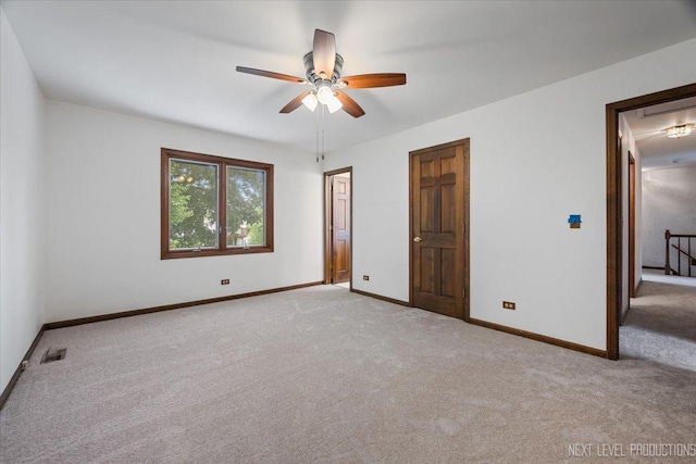 1054 Maple Ln, Batavia, IL 60510 - unfurnished bedroom featuring carpet flooring, attic access, and ceiling fan
