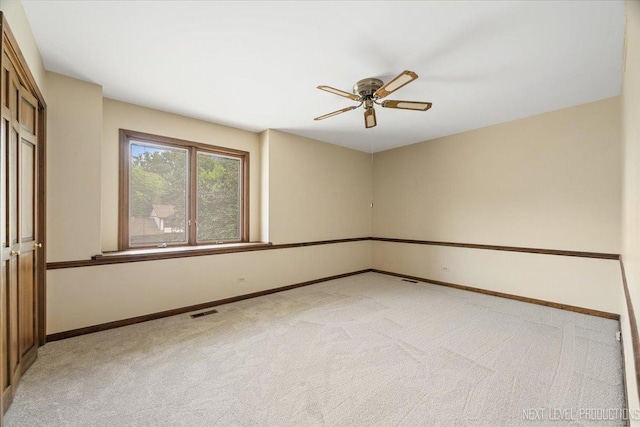 1054 Maple Ln, Batavia, IL 60510 - unfurnished room with ceiling fan and light carpet