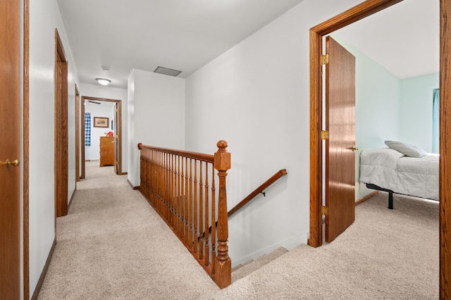 15181 Willow Run Dr, Dekalb, IL 60115 - hallway with an upstairs landing and carpet flooring