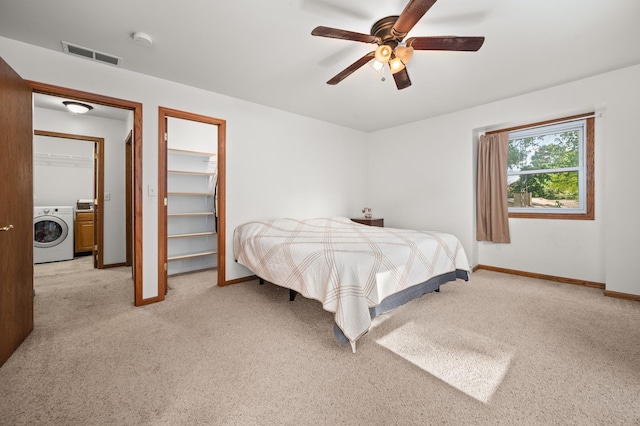15181 Willow Run Dr, Dekalb, IL 60115 - bedroom with washer / dryer, light colored carpet, and a ceiling fan