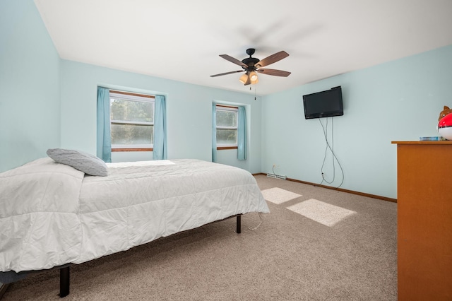 15181 Willow Run Dr, Dekalb, IL 60115 - carpeted bedroom with baseboards and a ceiling fan