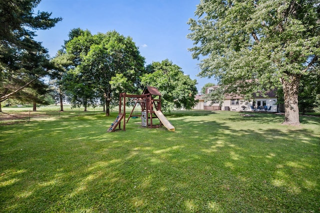 15181 Willow Run Dr, Dekalb, IL 60115 - view of green lawn with a playground