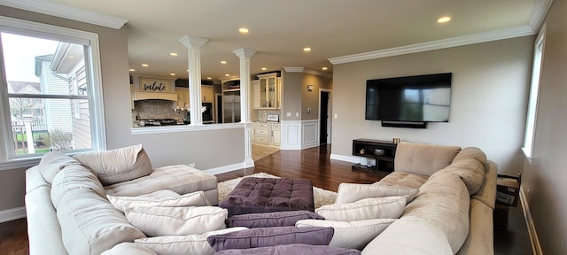3004 Wayland Ave, Elgin, IL 60124 - living area with healthy amount of natural light, recessed lighting, crown molding, dark wood-style flooring, and decorative columns