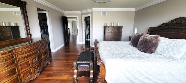 3004 Wayland Ave, Elgin, IL 60124 - bedroom featuring dark wood-type flooring, crown molding, a spacious closet, and a closet